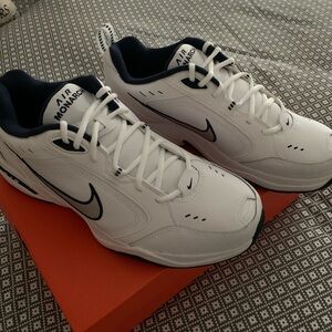 Nike Air Monarch. Men’s split size. Left is 12D and Right is size 13 4E New.